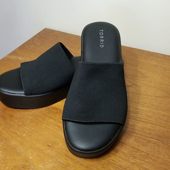 black stretch platform slide